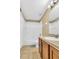 Clean bathroom, featuring a bathtub, toilet and vanity with wood cabinets at 5333 River Rock Rd, Lakeland, FL 33809