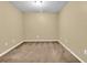 Empty bedroom with brown carpet and neutral walls at 5333 River Rock Rd, Lakeland, FL 33809
