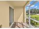 Relaxing screened patio with view of lush landscaping at 5333 River Rock Rd, Lakeland, FL 33809