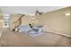 Bright living room featuring neutral walls and carpet at 5333 River Rock Rd, Lakeland, FL 33809