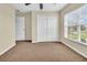 Bedroom with double door closet and large window with blinds at 5333 River Rock Rd, Lakeland, FL 33809
