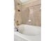 Relaxing bathroom featuring a garden tub and tile surround at 5333 River Rock Rd, Lakeland, FL 33809