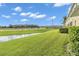 Pond view and highway from the backyard at 5333 River Rock Rd, Lakeland, FL 33809