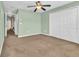 Spacious bedroom with double doors and carpet at 5333 River Rock Rd, Lakeland, FL 33809