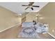Open living room showcasing neutral decor and carpet at 5333 River Rock Rd, Lakeland, FL 33809