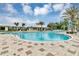 Large community pool with plenty of lounge chairs at 1948 Tohoqua Blvd, Kissimmee, FL 34744