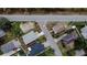 Aerial view showing a newly constructed home and surrounding neighborhood at 1138 Avenue E, Haines City, FL 33844
