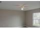 Bright bedroom with ceiling fan and large window at 1138 Avenue E, Haines City, FL 33844
