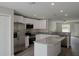 Modern kitchen featuring stainless steel appliances and granite countertops at 1138 Avenue E, Haines City, FL 33844