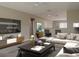 Bright living room with a sectional sofa and modern decor at 1138 Avenue E, Haines City, FL 33844