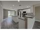 Open kitchen features granite counters and breakfast bar at 1138 Avenue E, Haines City, FL 33844