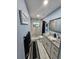 Modern bathroom with walk-in shower, vanity, and stylish fixtures at 4810 N Galloway Rd, Lakeland, FL 33810