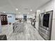 Modern kitchen with granite counters, white cabinets, and stainless steel appliances at 4810 N Galloway Rd, Lakeland, FL 33810
