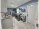 Spacious laundry room equipped with modern appliances, ample counter space, and storage at 4810 N Galloway Rd, Lakeland, FL 33810