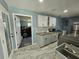 Convenient laundry room located near the garage access with modern amenities at 4810 N Galloway Rd, Lakeland, FL 33810