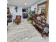 Living room detail showcasing stylish furniture and light-colored tile flooring at 4810 N Galloway Rd, Lakeland, FL 33810