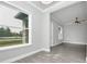 Bright dining room with gray tile floors and large windows at 19073 Sabal St, Orlando, FL 32833