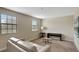 Bright bonus room with window seating and neutral decor at 9151 Wedge Dr, Davenport, FL 33896