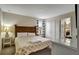 Cozy bedroom with double bed and ensuite bathroom access at 9151 Wedge Dr, Davenport, FL 33896