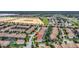 Aerial view of a house in a residential neighborhood at 9151 Wedge Dr, Davenport, FL 33896