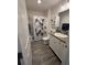 Bathroom with tub, shower, toilet, and vanity at 4415 Casey Ct, The Villages, FL 32163