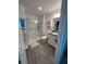 Clean bathroom with shower, toilet and vanity at 4415 Casey Ct, The Villages, FL 32163