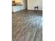 Gray vinyl plank flooring throughout the main living area at 4415 Casey Ct, The Villages, FL 32163