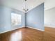 Simple dining room with light blue walls and wood flooring at 5836 Daughtery Downs Loop, Lakeland, FL 33809