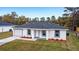 Newly built single-Gathering home with a gray roof at 15499 Sw 27Th Ln, Ocala, FL 34481