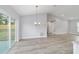 Bright dining room with sliding glass doors leading to the patio at 15499 Sw 27Th Ln, Ocala, FL 34481
