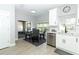 Kitchen with stainless steel dishwasher and breakfast nook area at 7126 Regina Way, Orlando, FL 32819