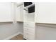 Large walk-in closet with shelves and drawers at 7126 Regina Way, Orlando, FL 32819