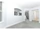Upper hallway with grey carpet and a view to below at 7126 Regina Way, Orlando, FL 32819