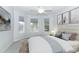 Serene bedroom with bay windows and cozy carpet at 7126 Regina Way, Orlando, FL 32819