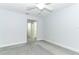 Spacious bedroom with neutral walls and carpeting at 7126 Regina Way, Orlando, FL 32819