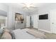 Spacious bedroom with a ceiling fan and a view of the hallway at 7126 Regina Way, Orlando, FL 32819