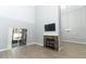 Living room features a fireplace and hardwood floors with high ceilings at 7126 Regina Way, Orlando, FL 32819