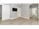 Primary bedroom with wood-look floors and access to the bathroom at 7126 Regina Way, Orlando, FL 32819