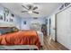 Bedroom with ceiling fan, dresser, and full bed at 2624 Delrose W Dr, Lakeland, FL 33805