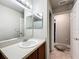 Bathroom with vanity and access to another room at 5411 Great Egret Dr, Leesburg, FL 34748