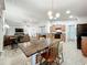 Kitchen dining area with a rustic wooden table and chairs at 5411 Great Egret Dr, Leesburg, FL 34748