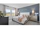 Elegant main bedroom with a plush bed and nightstands at 5787 Gingham Dr, Kissimmee, FL 34758