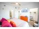 Main bedroom with a king-size bed, dresser, and a large closet at 13415 Blue Heron Beach Dr # 1101, Orlando, FL 32821