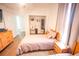 Bedroom with twin bed, nightstand, and plenty of closet space at 13415 Blue Heron Beach Dr # 1101, Orlando, FL 32821