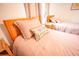 Bedroom with twin bed, nightstand, and calming decor at 13415 Blue Heron Beach Dr # 1101, Orlando, FL 32821