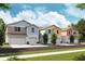 Modern townhouses with attached garages at 4313 Hillock Blvd, Haines City, FL 33844