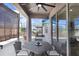 Outdoor patio with seating area and a TV mount at 251 Tomelloso Way, Davenport, FL 33837