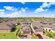 Aerial view of house with a red truck parked in the driveway at 251 Tomelloso Way, Davenport, FL 33837