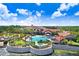 Resort-style pool with a clubhouse and lush landscaping at 251 Tomelloso Way, Davenport, FL 33837