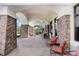 Covered patio with comfortable seating, ideal for relaxing at 251 Tomelloso Way, Davenport, FL 33837